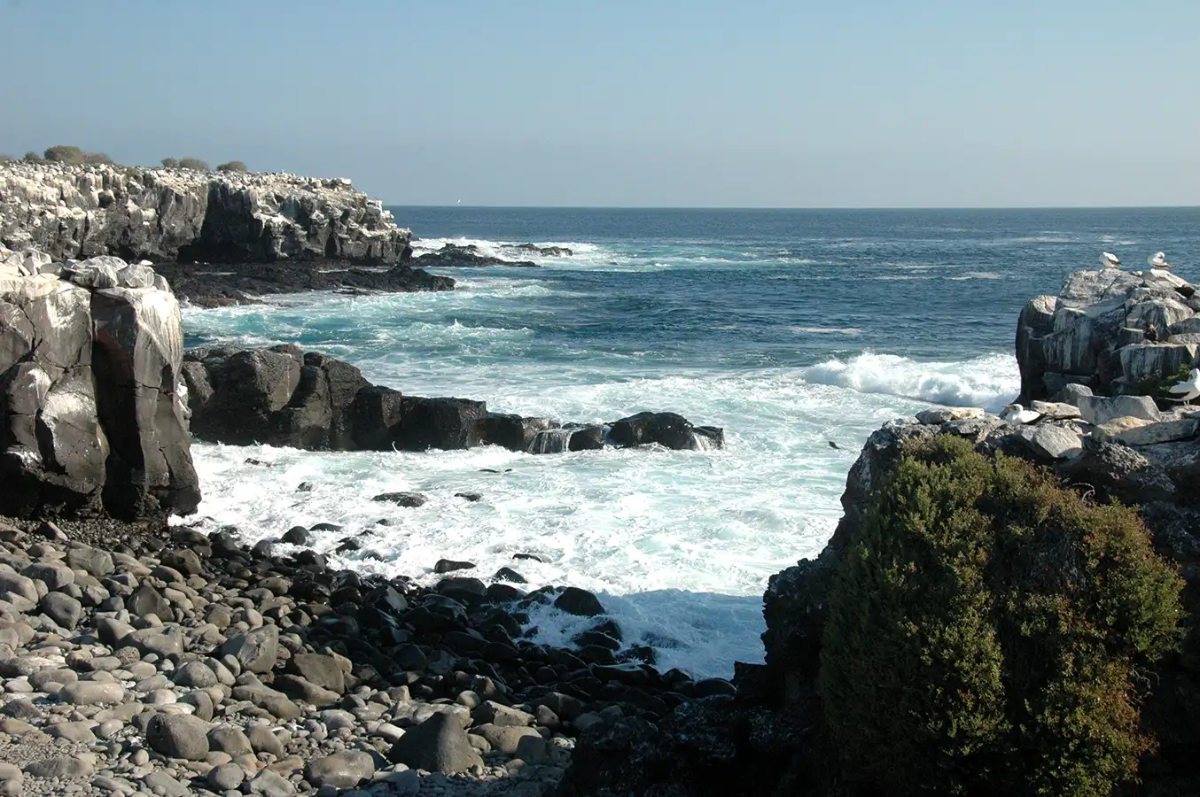Aerial view of Enderby Island with crystal-clear waters in the Galapagos
